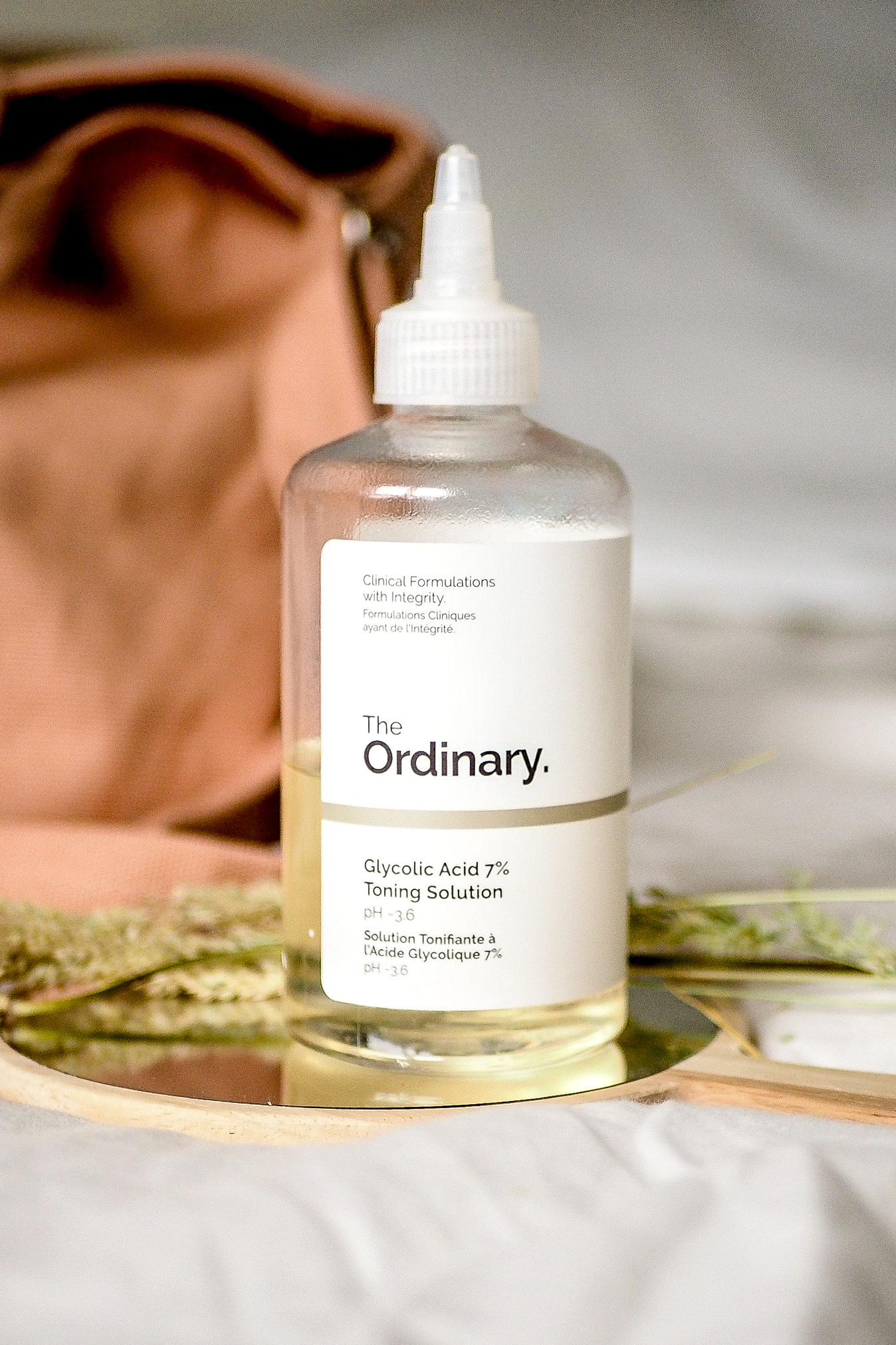 The Ordinary Glycolic 7% Toning Solution is a great budget but very effecting AHA exfoliater. It removes the top layer of dead skin to reveal fresher, more even skin.