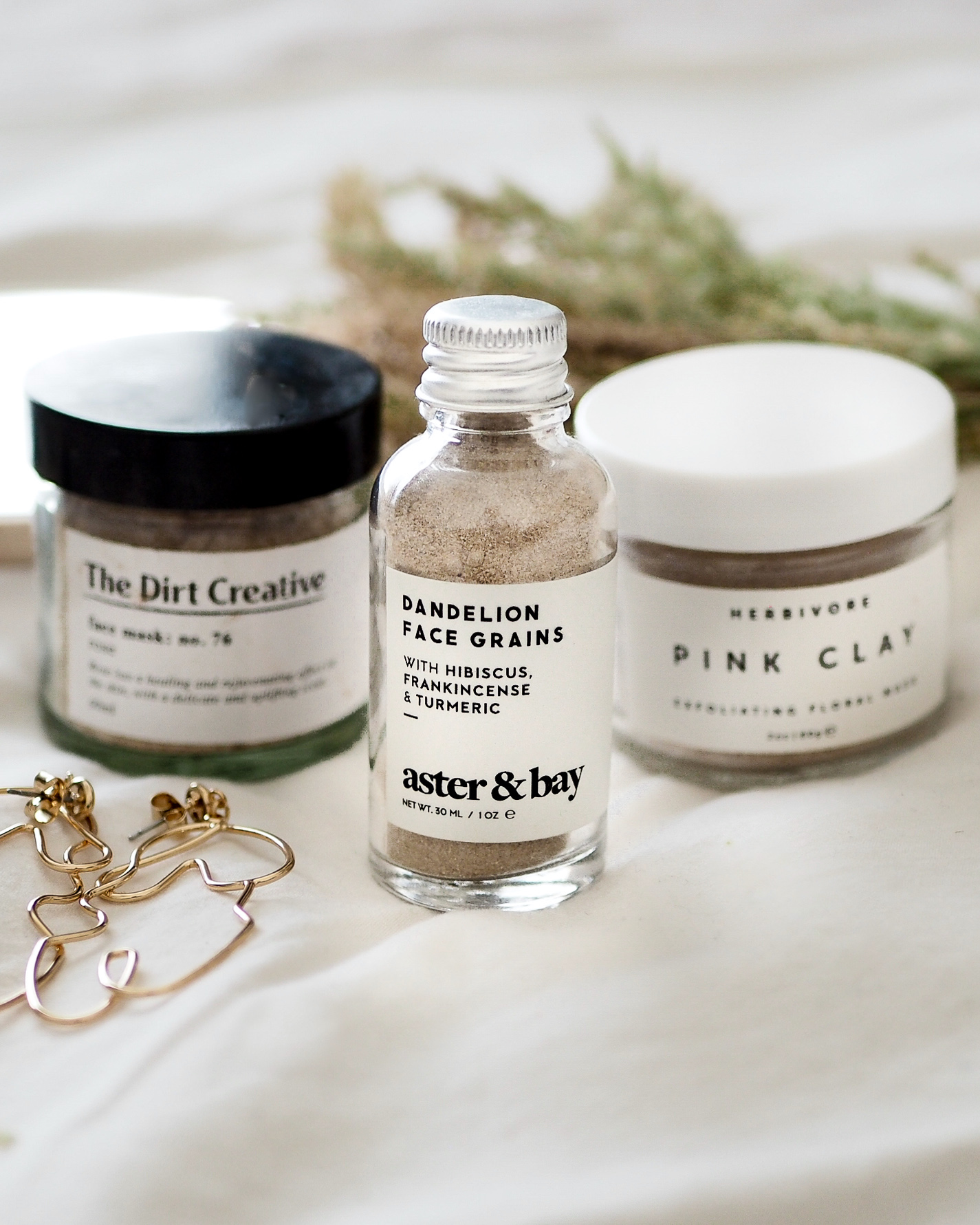 selection of ethical, small batch face masks from the dirt creative, aster and bay, herbivore botanicals