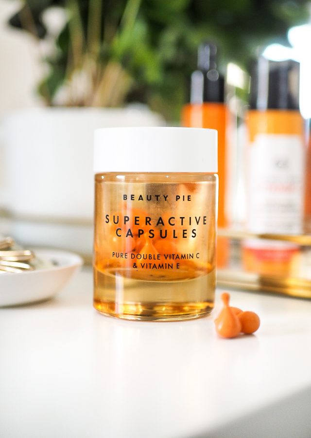 beauty pie vitamin c capsules sitting on vanity